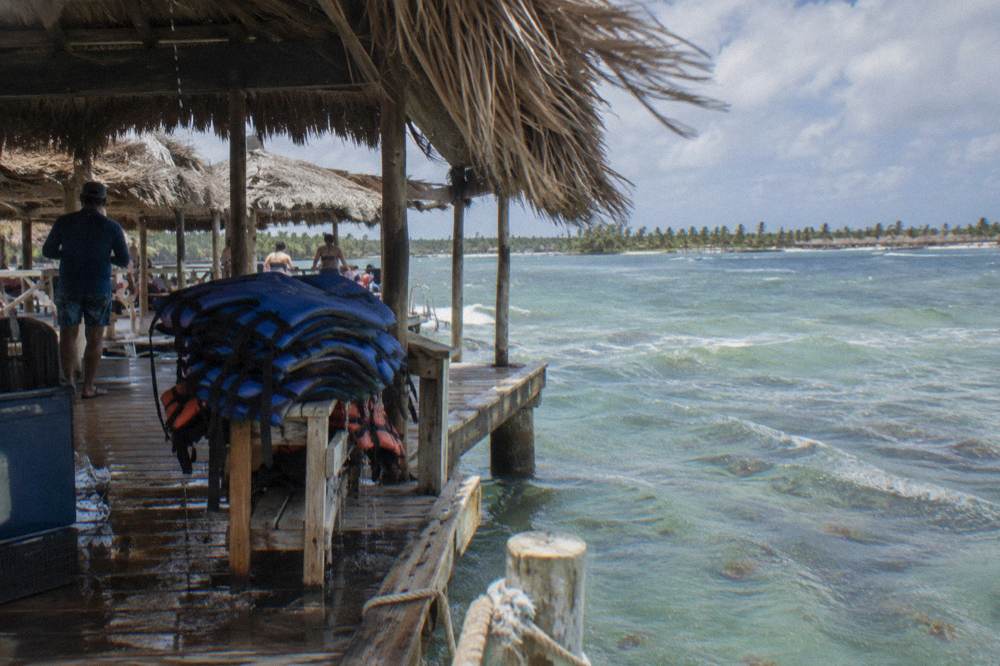 Open-sided marine park structure above clear shallow water