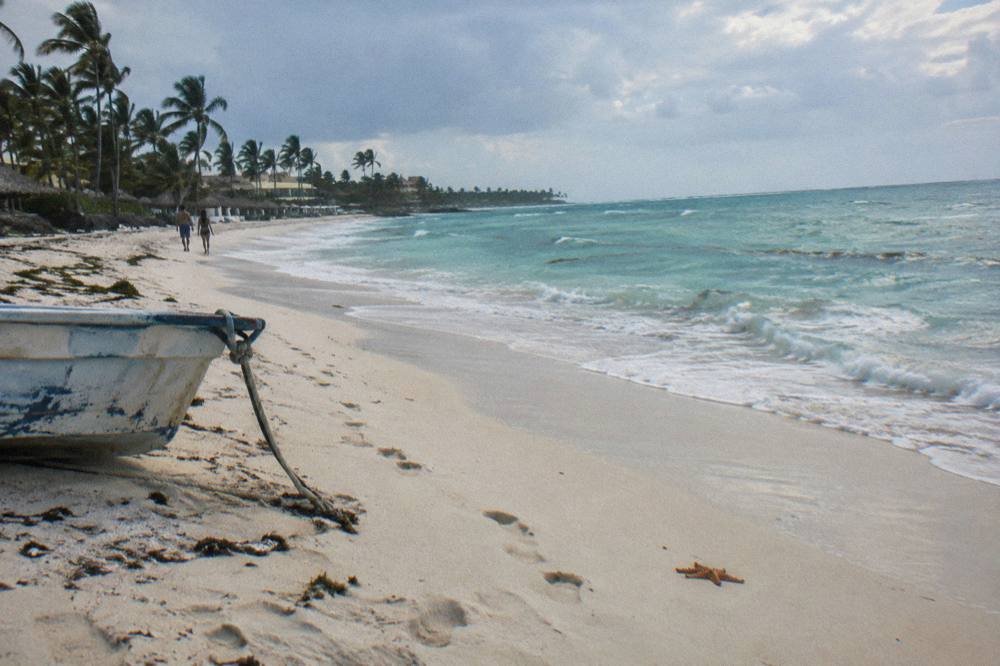 Quiet stretch of pale sand and turquoise water along the Punta Cana shoreline